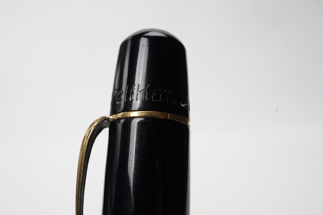 A Pelikan 100N fountain pen fitted with a 14ct. gold Pelikan nib